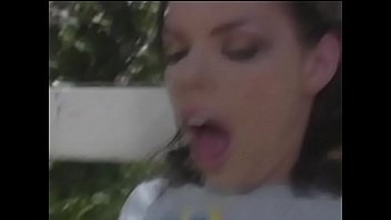 Fit dude stretches sexy 's ass on a park bench