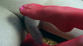 Plays with a dick in heels and jerks off a dick with her feet foot fetish cumshot on her feet