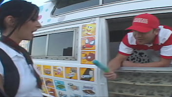 While giving the ice cream man and upskirt of her panties as she sits in the back of his