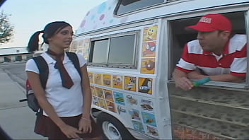 While giving the ice cream man and upskirt of her panties as she sits in the back of his