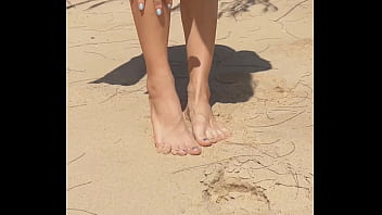 Naked teen girl shows pussy legs and feet and toes foot leg fetish on nudist beach public outdoor