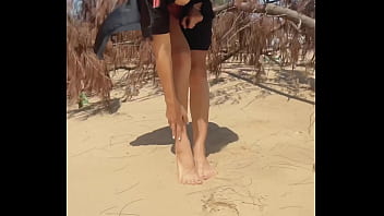 Naked teen girl shows pussy legs and feet and toes foot leg fetish on nudist beach public outdoor