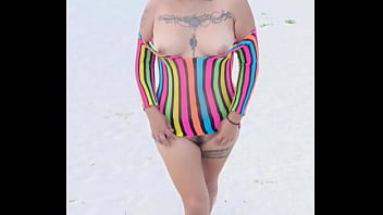 Flashing in the beach show my tits and pussy