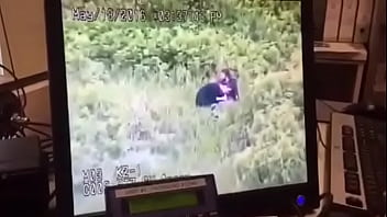 Couple caught outdoor through camera