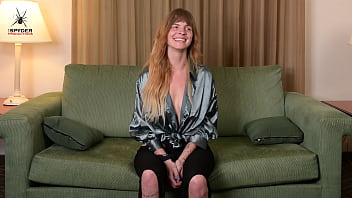 Hazel ash modeling a shiny button down and leggings