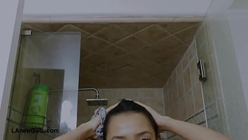 Elegant teen model enjoys a sensual bath