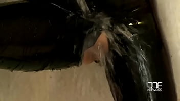 Bartroom dildoing in latex