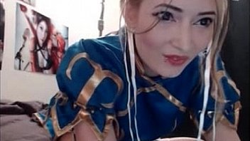 Blonde dressed in asian masturbating