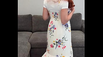 A redhead in a dress