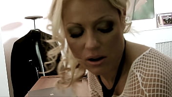 Blonde secretary fucks the big boss on his desk through her fishnets