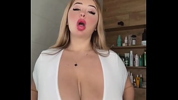 An adult milf with natural tits is waiting caressing