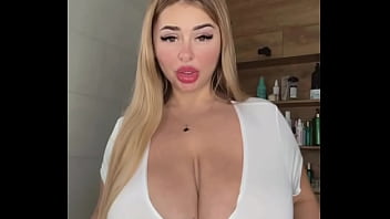 An adult milf with natural tits is waiting caressing