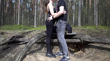 Pretty brunette sucking cock and rimming guy's ass outdoors