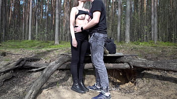 Pretty brunette sucking cock and rimming guy's ass outdoors