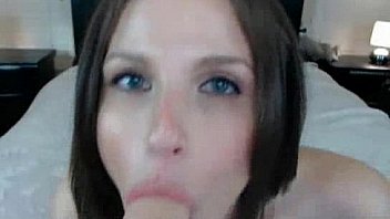 Busty babe on cam plays with dildo