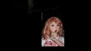 Small busty sex doll posing in pink