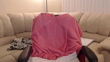 Chubby blonde shows her nice tits and puts a dildo inside her