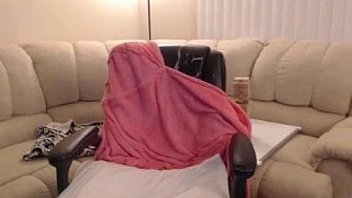 Chubby blonde shows her nice tits and puts a dildo inside her