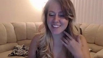 Chubby blonde shows her nice tits and puts a dildo inside her