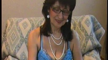Mature in sexy lingerie masturbates