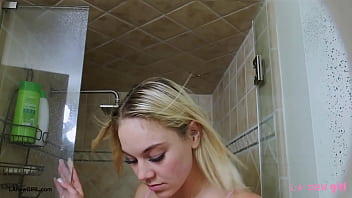 Attractive blonde model enjoys a sensual bath