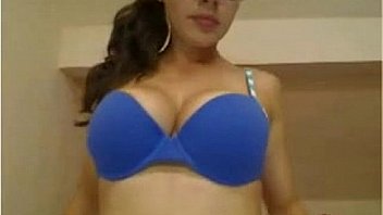 Nice busty girl with glasses reveals her tits