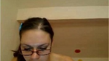 Nice busty girl with glasses reveals her tits