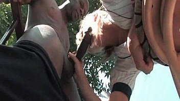 Blonde hooker sucking massive black dong