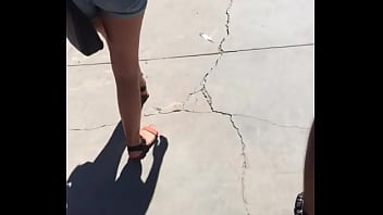 Sexy girl in booty shorts walking voyeur