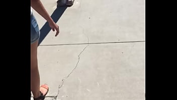 Sexy girl in booty shorts walking voyeur