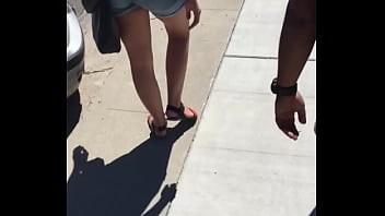 Sexy girl in booty shorts walking voyeur