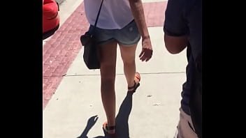 Sexy girl in booty shorts walking voyeur