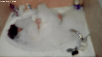 Solo bubble bathing boy