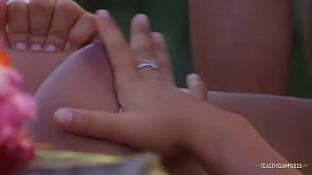 Her shaved asian pussy starts dripping when she gets fingered in the garden