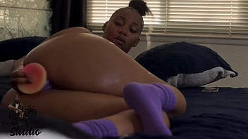 Fucking her with this oversized dildo