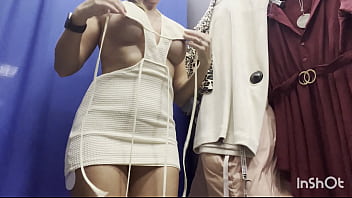 A naked woman in a public fitting room A naked woman in a public fitting room
