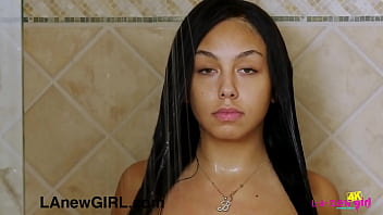 Striking brunette girl rinsed off