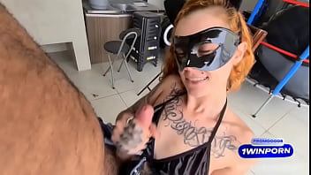 Eating the masked kitten on the table