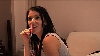 Lubing up her big tits and her meaty pussy