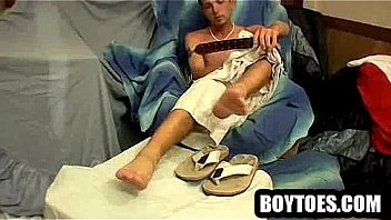 Amateur Stud Showing Off His Feet And Tugging His Cock thumbnail