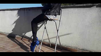 Denim shorts black tights and gorgeous 8 inch heels