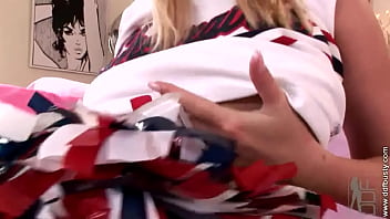 Busty cheerleader masturbating with a vibrator