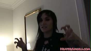 Goth stunner enjoys naked photoshoot