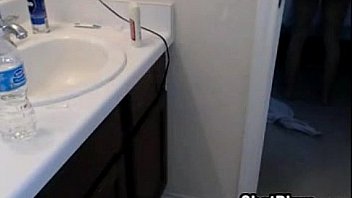 Cute blonde chick chats and takes a bath