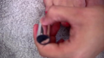 My step sister in a short dress painting her nails