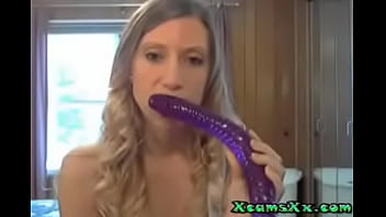She takes a huge dildo in her ass on webcam