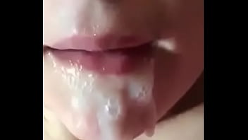 Thick cum dripping from her mouth