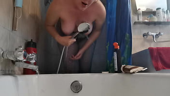 Italian stepmom wets her pantyhose in the shower to turn you on