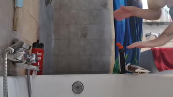 Italian stepmom wets her pantyhose in the shower to turn you on