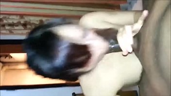 Asian sucks a black cock